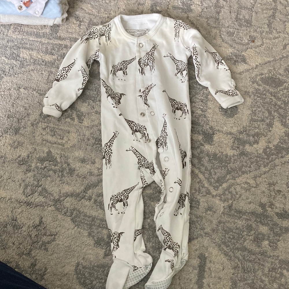 L’oved baby 3-6 month onesie with giraffes. Slight staining around neck.